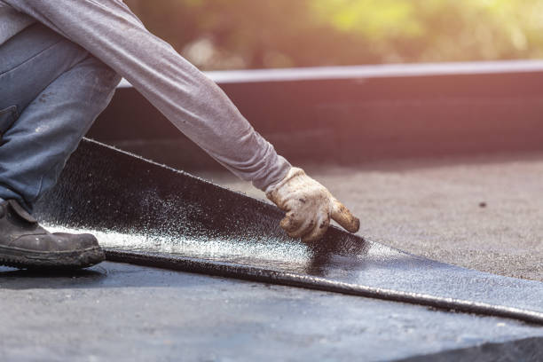Professional Basement Waterproofing technician working in South Pittsburg, TN